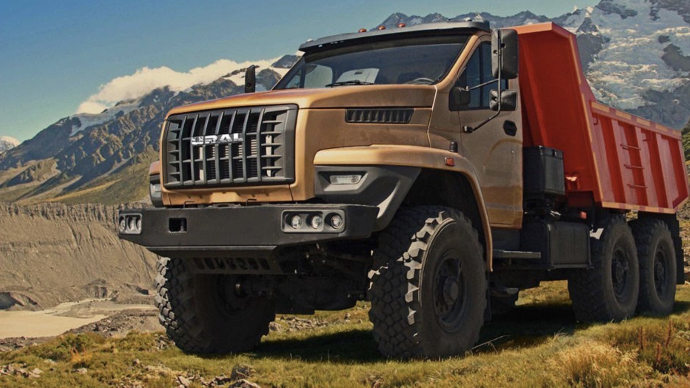 Modern URAL NEXT 6x6 dump truck in mountainous terrain